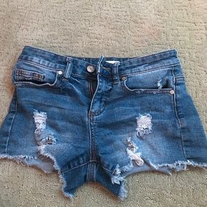 Altered stare ripped jean shorts